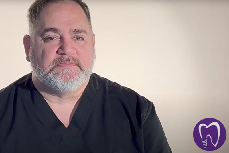 headshot of doctor video thumbnail