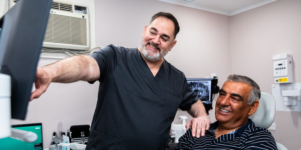 patient and doctor going over dental procedure information